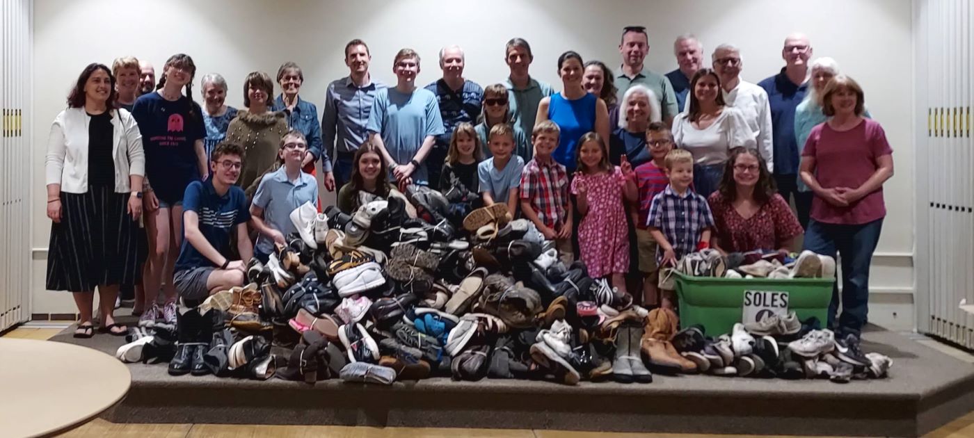 a group picture of the adult choir.