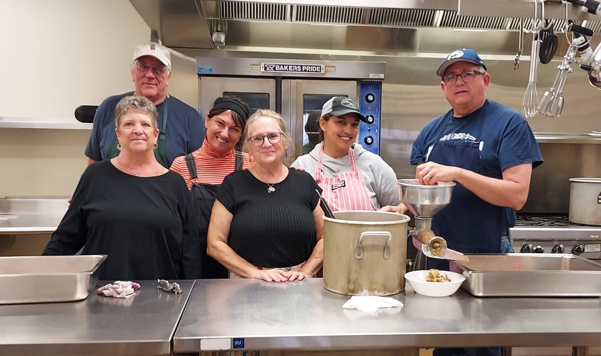 a group picture of the adult choir.